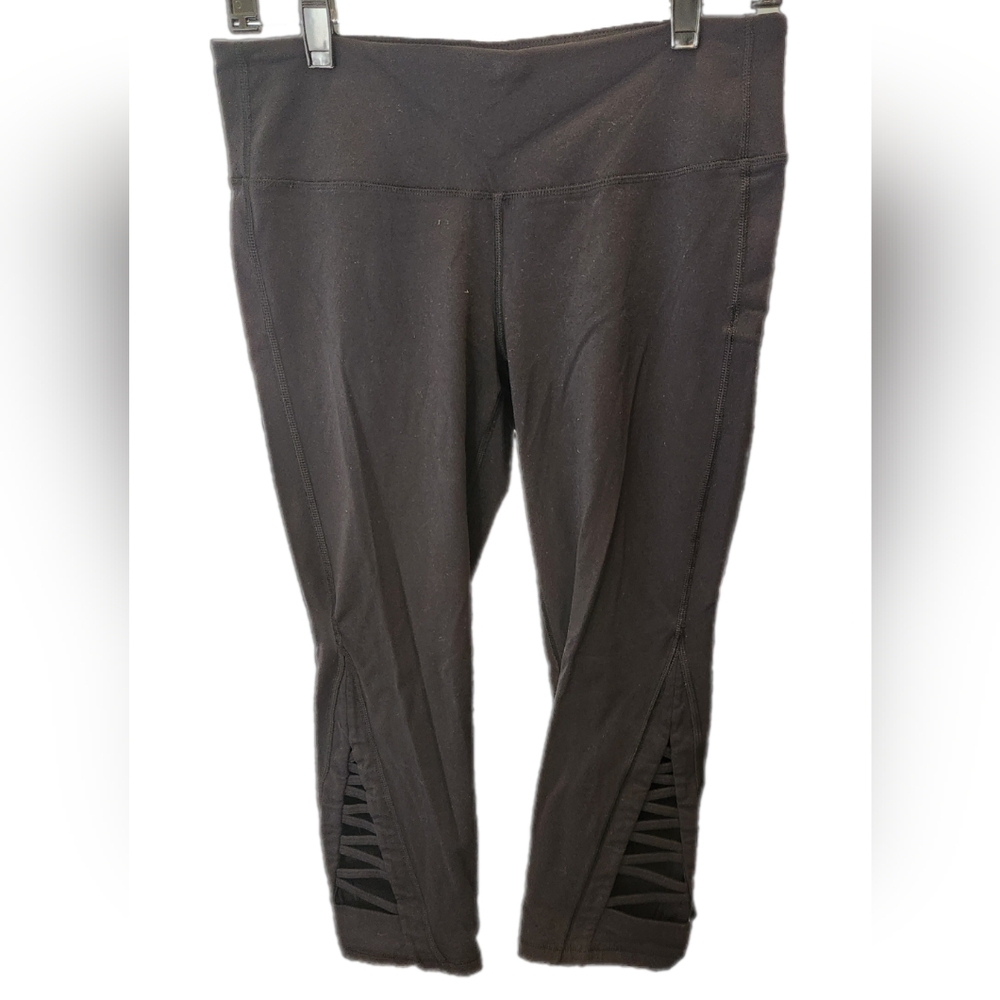Athleta black capri leggings with side cutouts